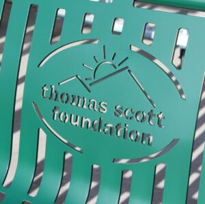 667de135e8ece_laser Thomas Scott bench sign